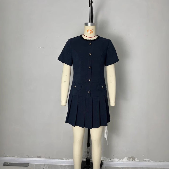 Short sleeved pleated jumpsuit